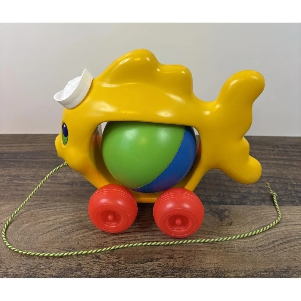 Vintage Pull Along Fish Toy Rolling Ball Rattle Plastic Sailor Hat
